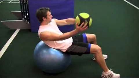 Med Ball Twist on Swiss Ball with Straight Arms