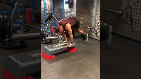 Plank with jump on a step
