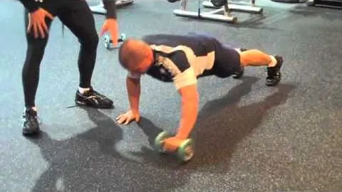 Single Arm Pushup With A Rollout