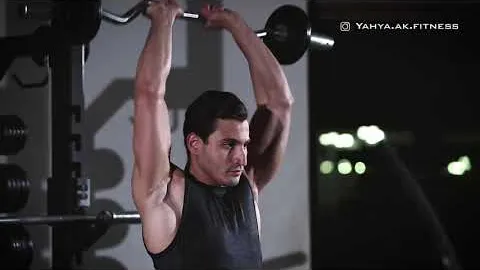 Standing Overhead Barbell Triceps Extension