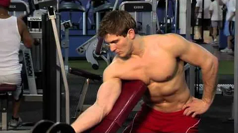 Standing One-Arm Dumbbell Curl Over Incline Bench